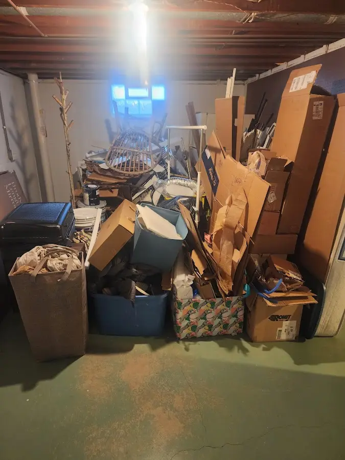 Roll-off dumpster container at job site for 8 Yard Dumpster Rental in West Bridgewater